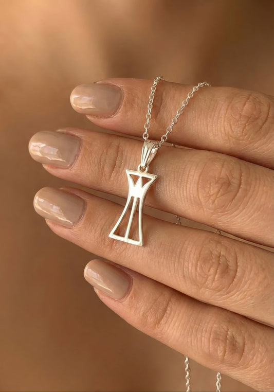 Sterling silver lotus column pendant necklace on hand